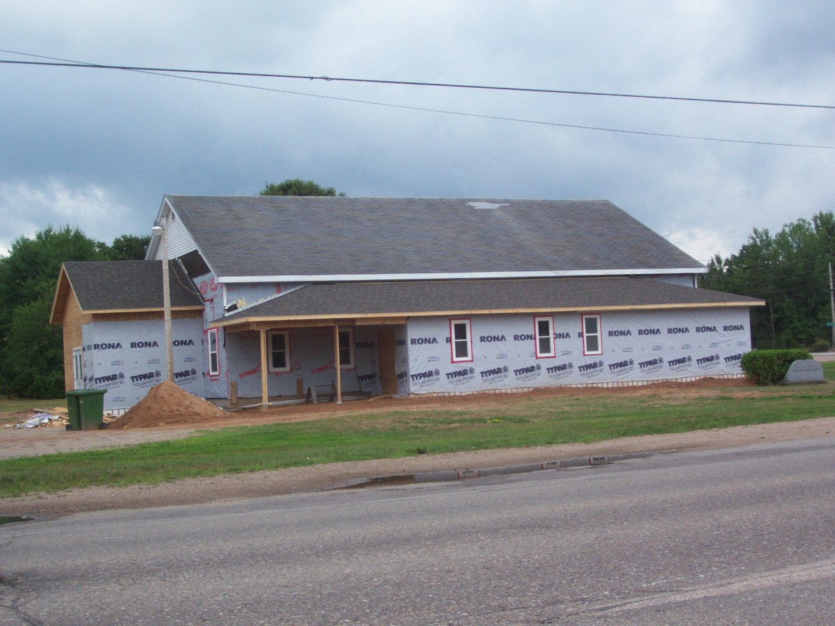 Roof shingled windows installed