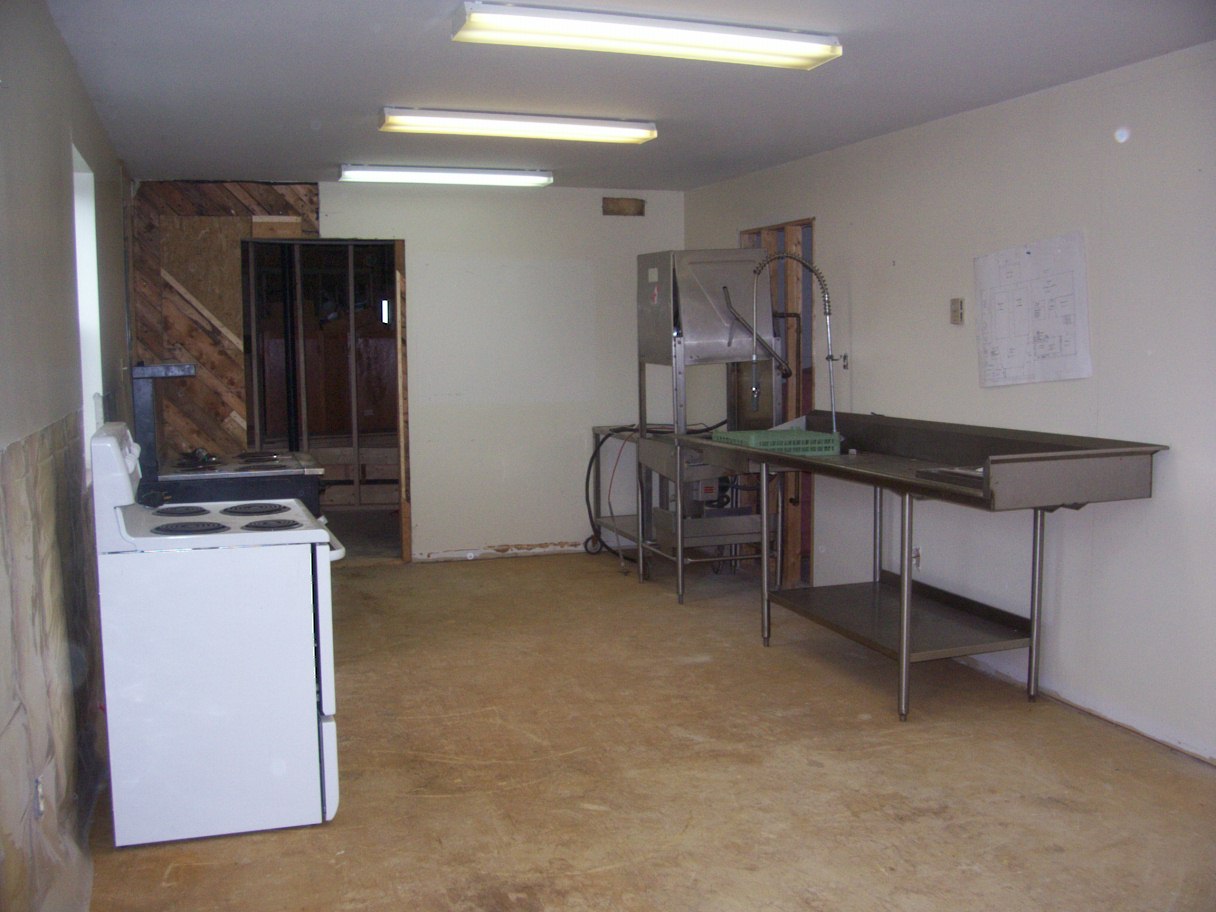 Getting started on the kitchen. Dishwasher and stoves put in place