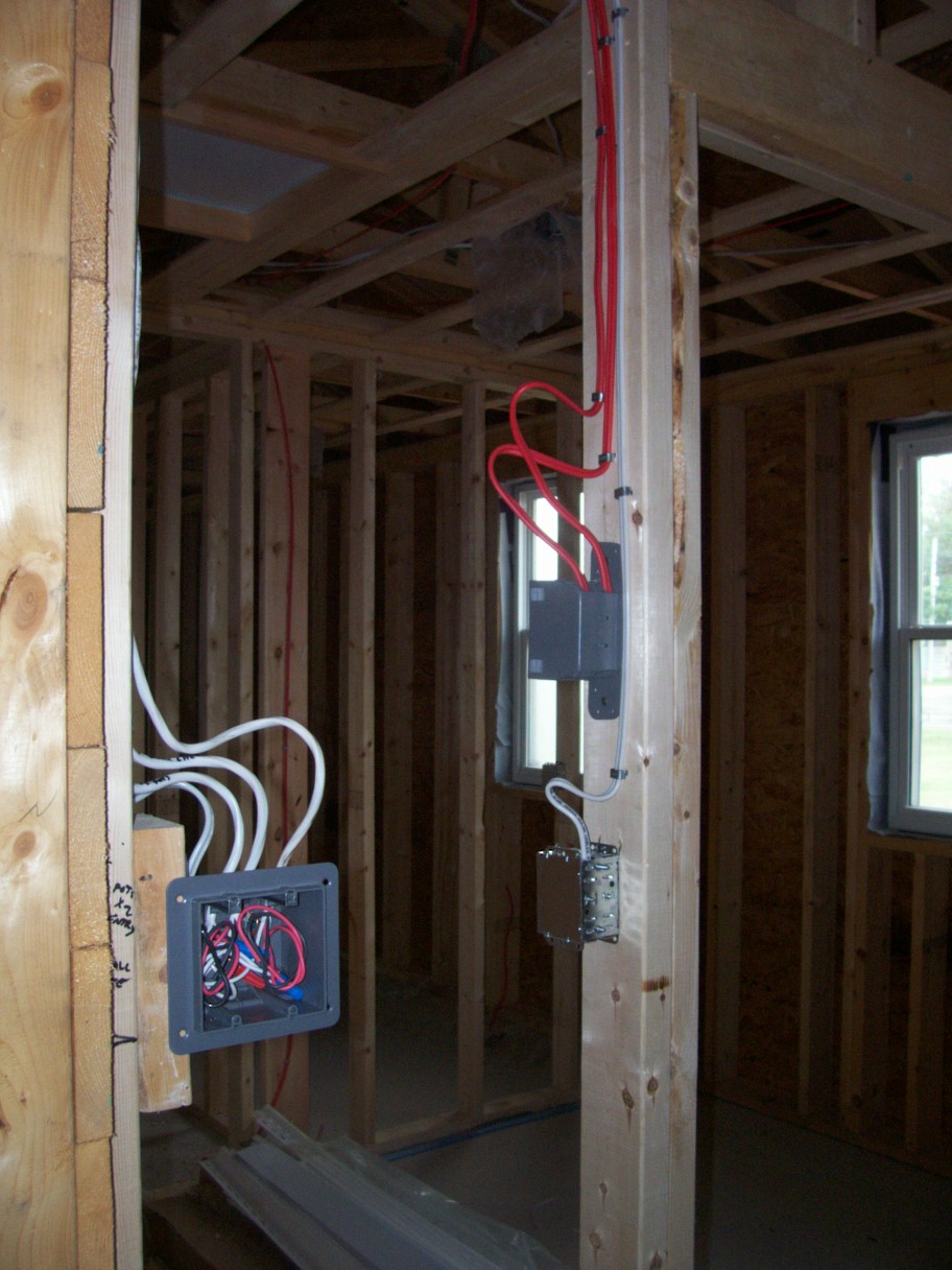 Electrician is beginning to wire the building.