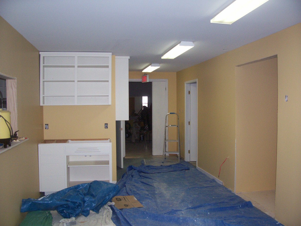 South hallway painted. Cabinets installed.